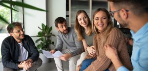 Group of people smiling and talking